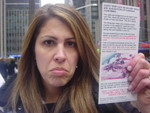 Flipper holding up depressing flyer of seal being skinned alive